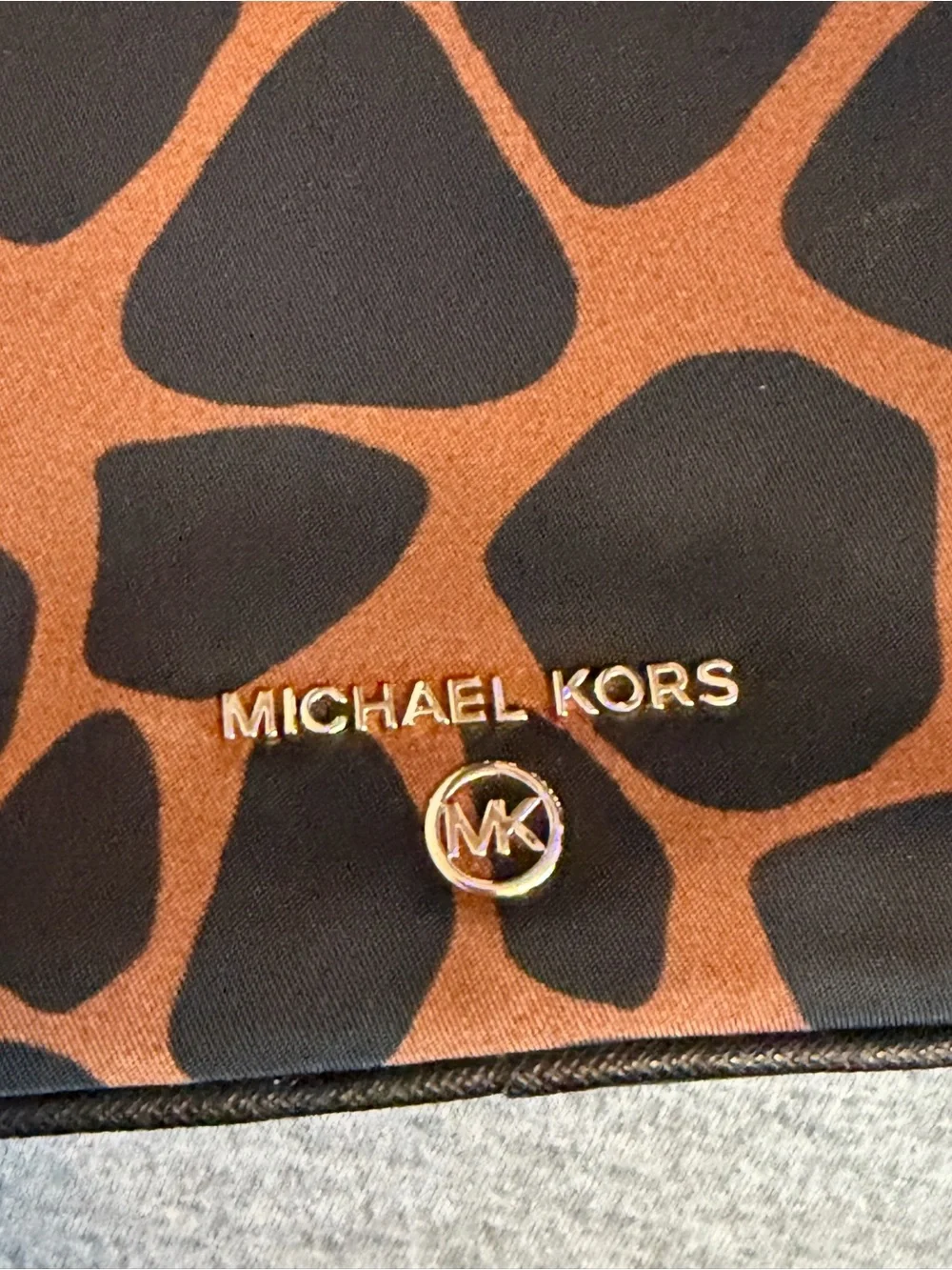 Michael Kors Giraffe Print Crossbody Clutch in Brown and Black